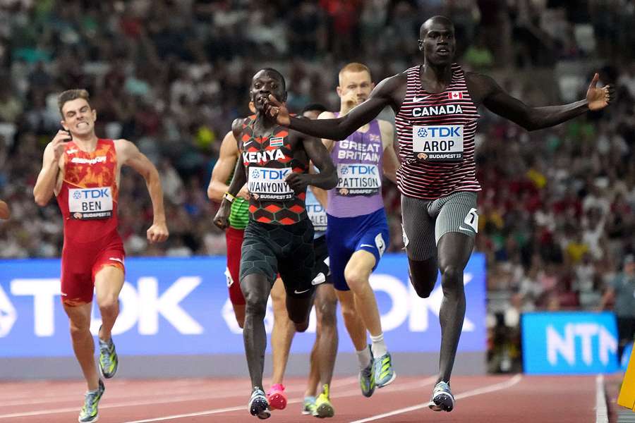 Marco Arop celebrates crossing the line in the 800m final