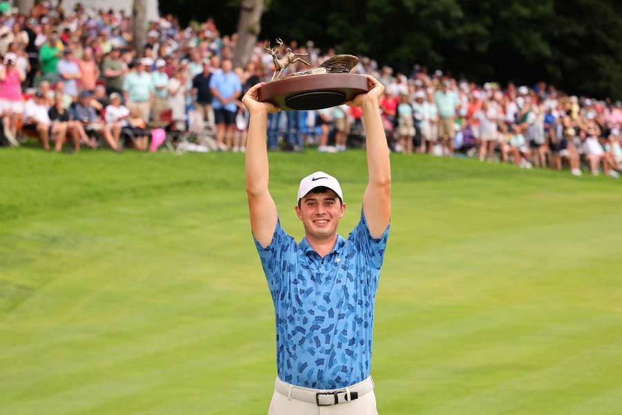 Thompson celebrates his win