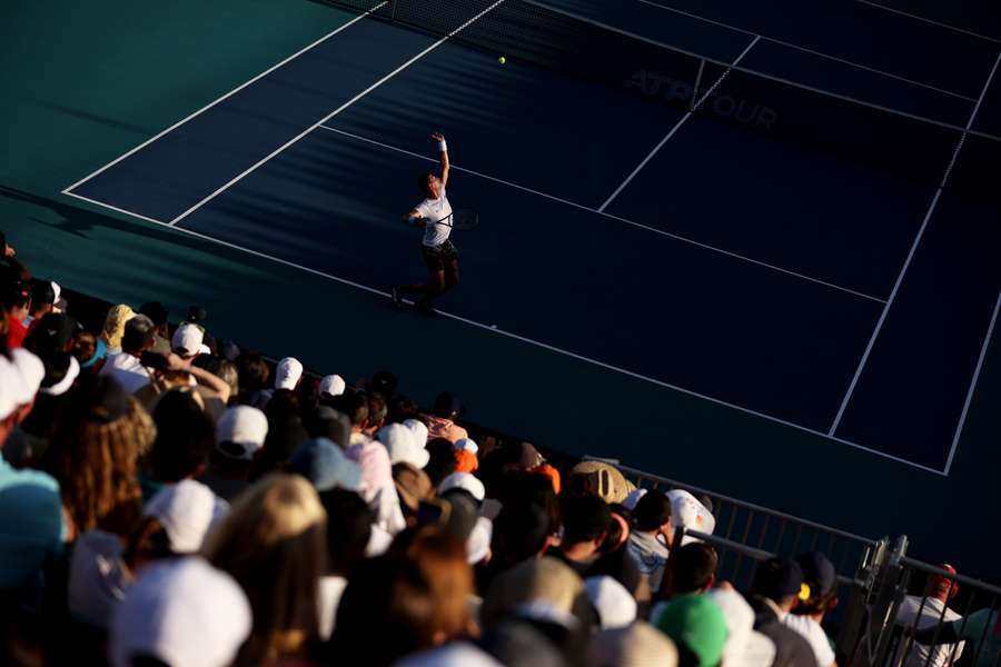 Thanasi Kokkinakis of Australia serves against Hubert Hurkacz of Poland