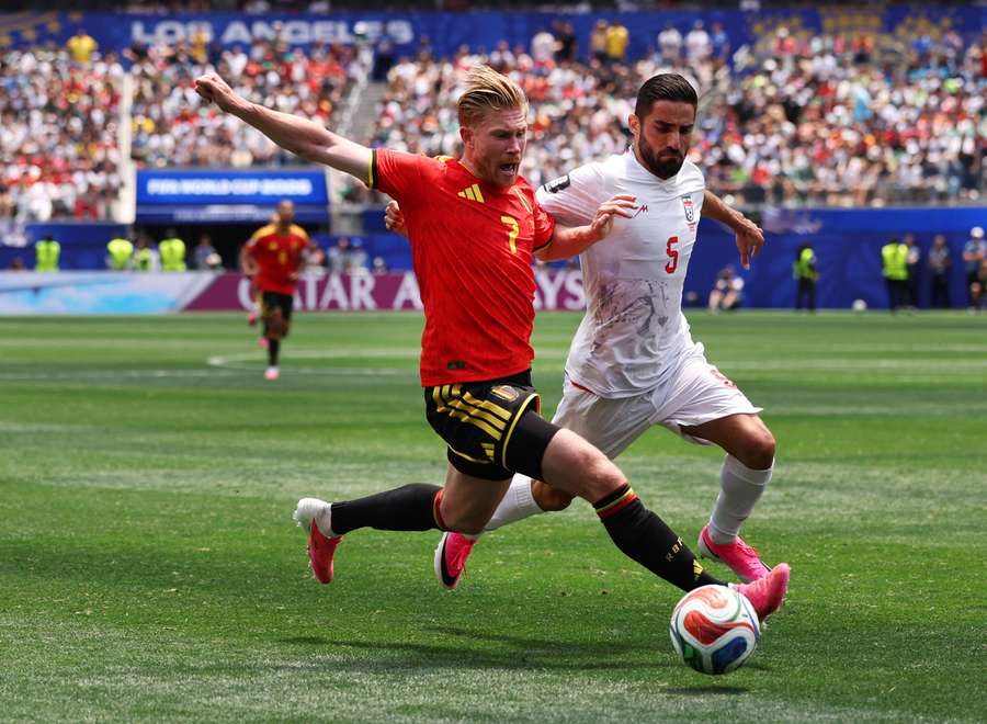 Belgium's Kevin De Bruyne in action with Iran's Milad Mohammadi Belgium's Kevin De Bruyne in action with Iran's Milad Mohammadi