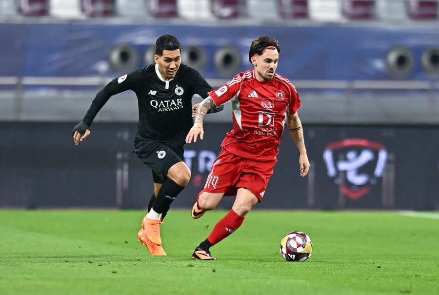 Rodri, perseguido por Firmino durante un partido en Catar Rodri, perseguido por Firmino durante un partido en Catar