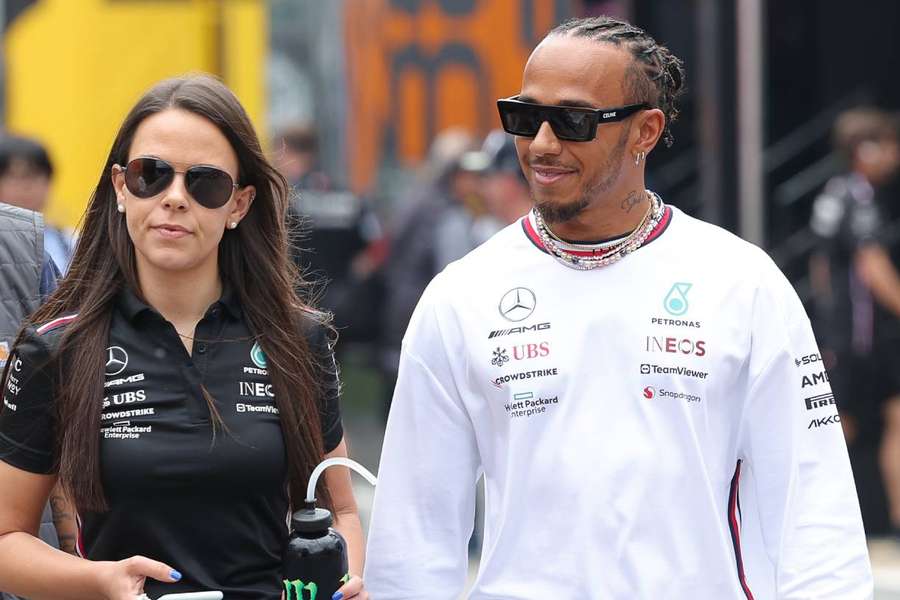 Lewis Hamilton walks into the paddock prior to qualifying