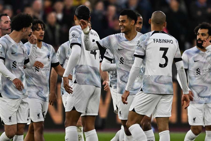 Liverpool celebrate their equalising goal against West Ham