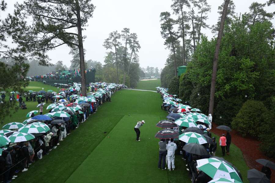 Jon Rahm plays his shot from the 18th tee as he looks to win the Green Jacket