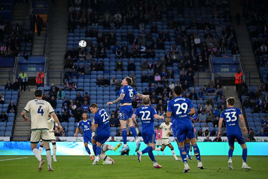 Harry Souttar rises up to win a header for Leicester City against Millwall. 