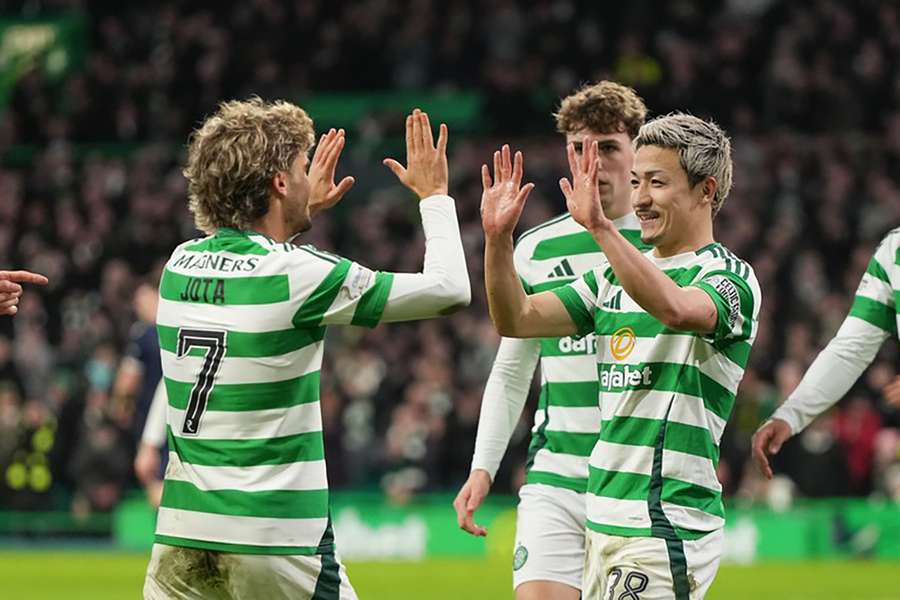 Maeda (R) celebrates with Jota after scoring for Celtic