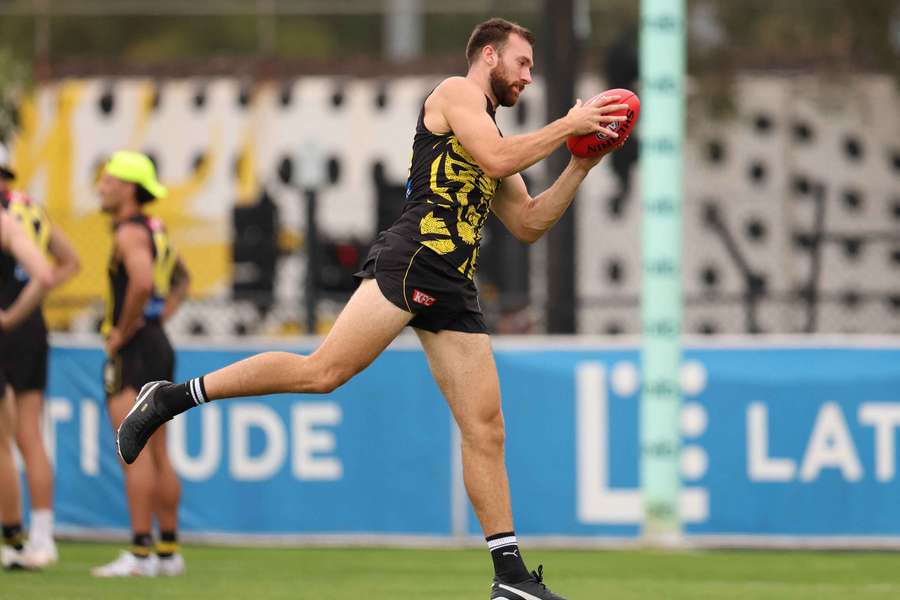 Noah Balta has played 104 AFL games for Richmond and continues to train with the club. 