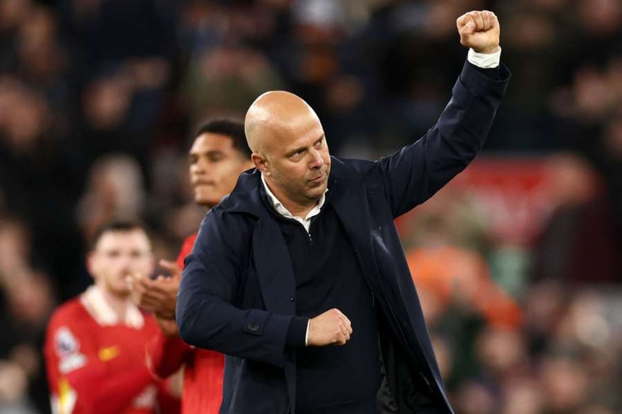 Liverpool head coach Arne Slot applauds the fans at full-time