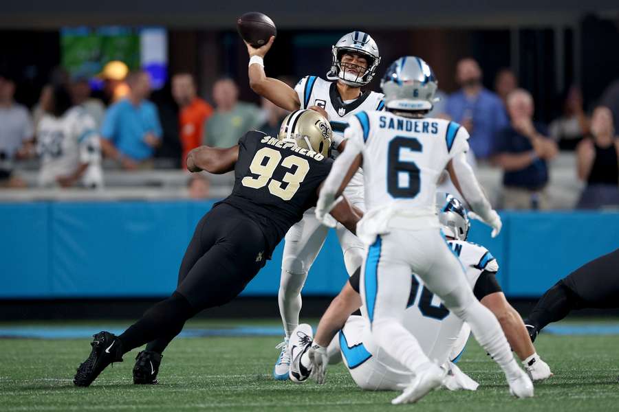 Bryce Young #9 of the Carolina Panthers throws a pass against the New Orleans Saints