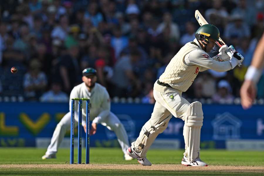 Australia's wicket keeper Alex Carey attempts to leave a ball from England's Chris Woakes but gets a touch and is caught out by England's Jonny Bairstow