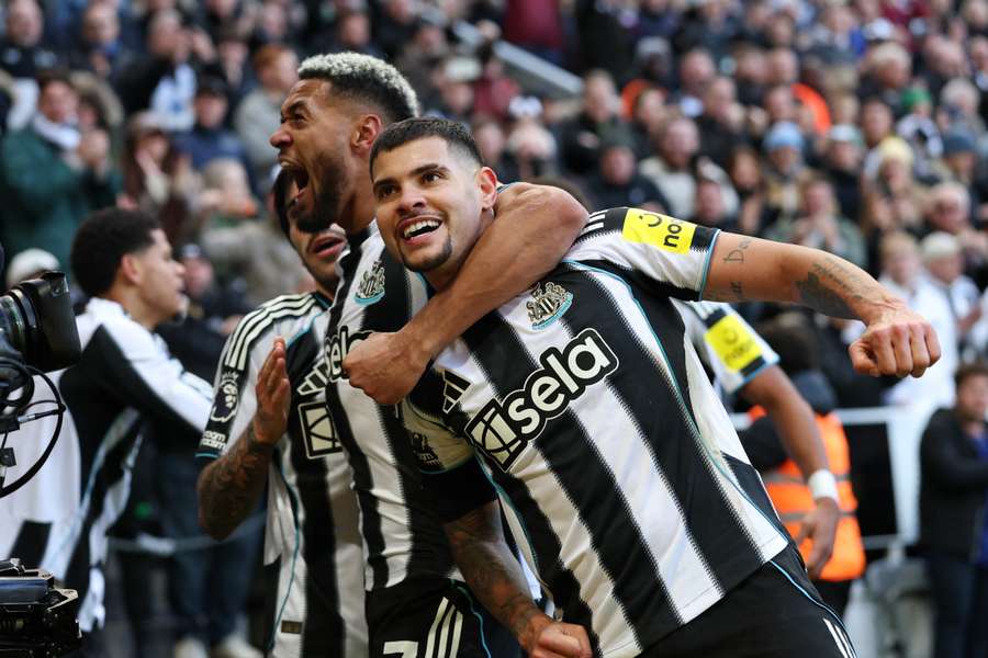Bruno Guimaraes celebrates with teammates after scoring in the 89th minute Bruno Guimaraes celebrates with teammates after scoring in the 89th minute