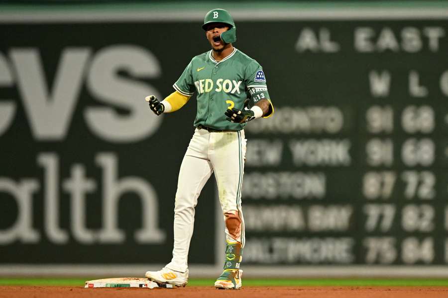 Red Sox's Ceddanne Rafaela reacts after hitting a walk-off to clinch a 2025 postseason spot