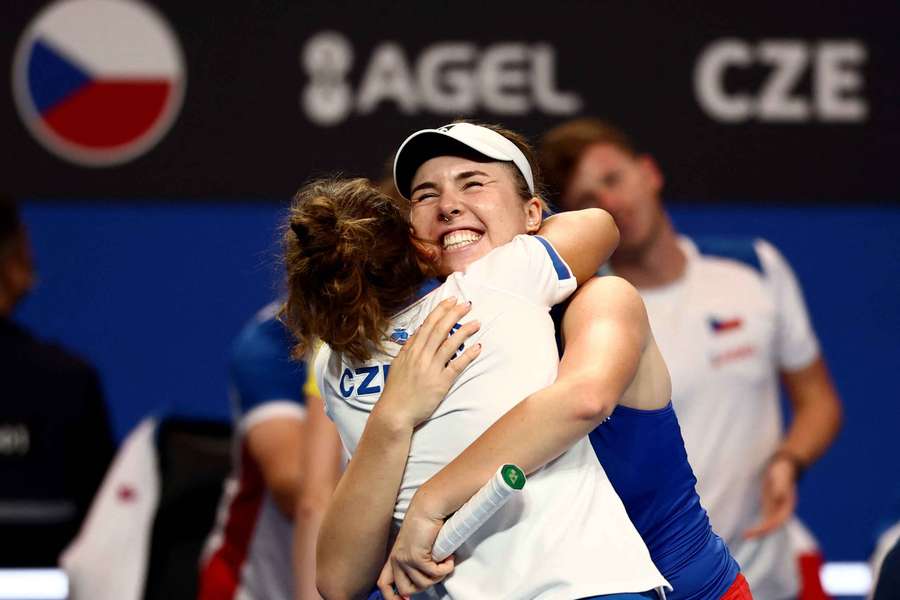 Czech Republic's Linda Noskova celebrates with team captain Barbora Strycova after winning her match against Spain's Cristina Bucsa Czech Republic's Linda Noskova celebrates with team captain Barbora Strycova after winning her match against Spain's Cristina Bucsa