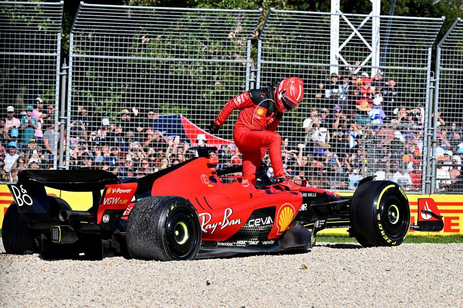 Charles Leclerc jumps out of the car after crashing at the Australian Grand Prix 