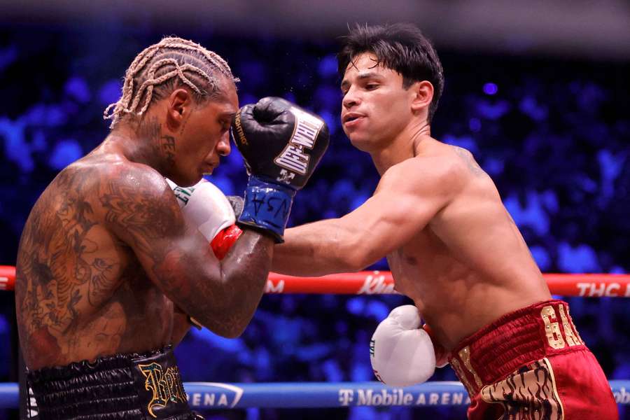 WBC welterweight champion Ryan Garcia (R) punches Conor Benn WBC welterweight champion Ryan Garcia (R) punches Conor Benn