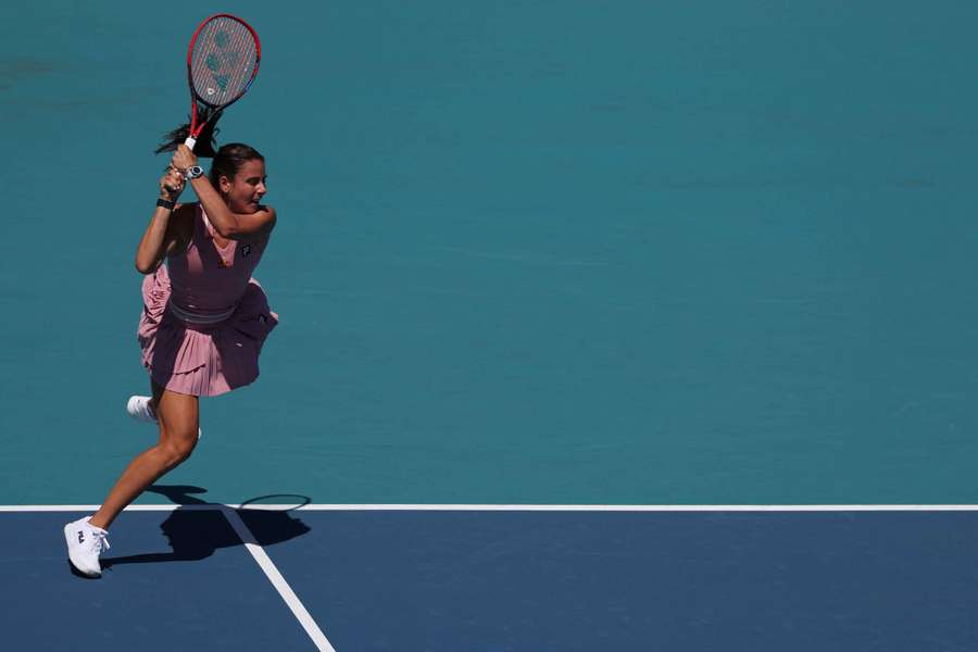 Emma Navarro hits a backhand against Emma Raducanu on day four of the Miami Open