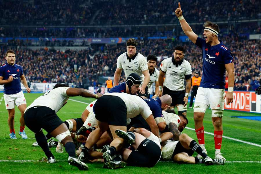 France's Paul Boudehent scores a try