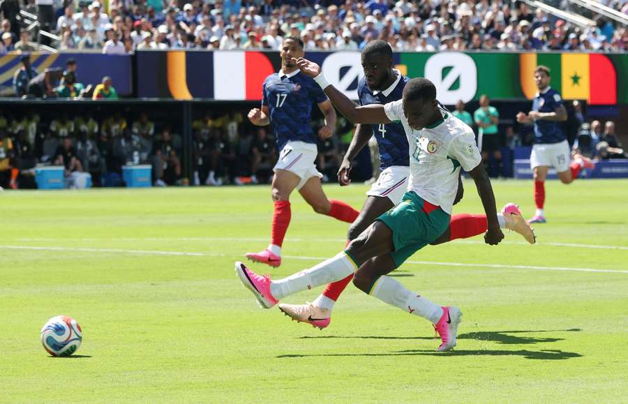 Senegal's Nicolas Jackson shoots at goal and hits the post Senegal's Nicolas Jackson shoots at goal and hits the post