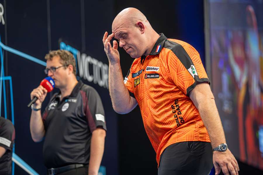 Van Gerwen reacts as the Netherlands are dumped out