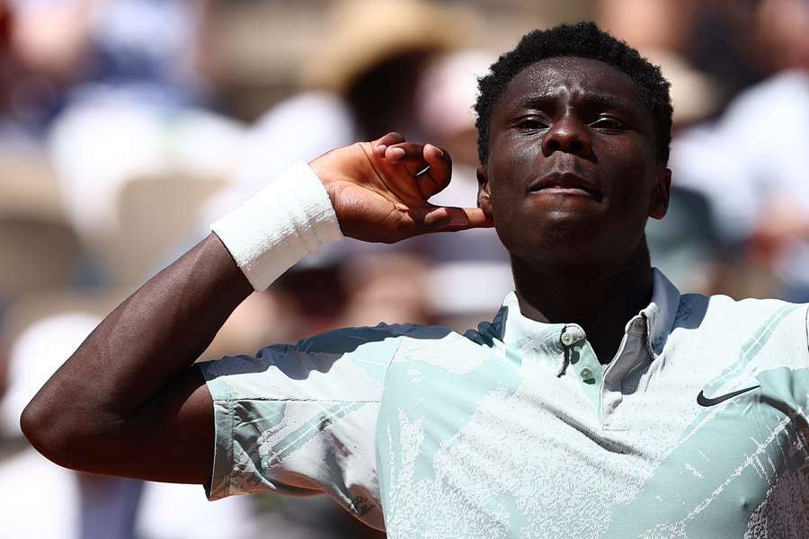 France's Moise Kouame reacts after winning the second set during his first-round match against Croatia's Marin Cilic France's Moise Kouame reacts after winning the second set during his first-round match against Croatia's Marin Cilic