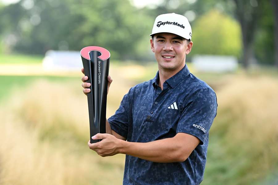 Michael Thorbjornsen holding Rocket Classic Trophy Michael Thorbjornsen holding Rocket Classic Trophy