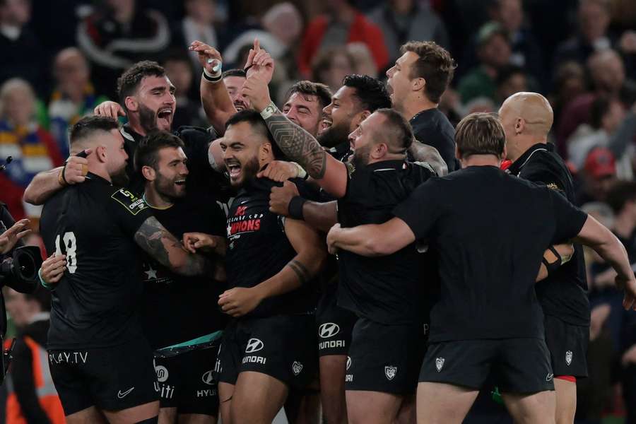 Toulon's players celebrate their victory in Dublin