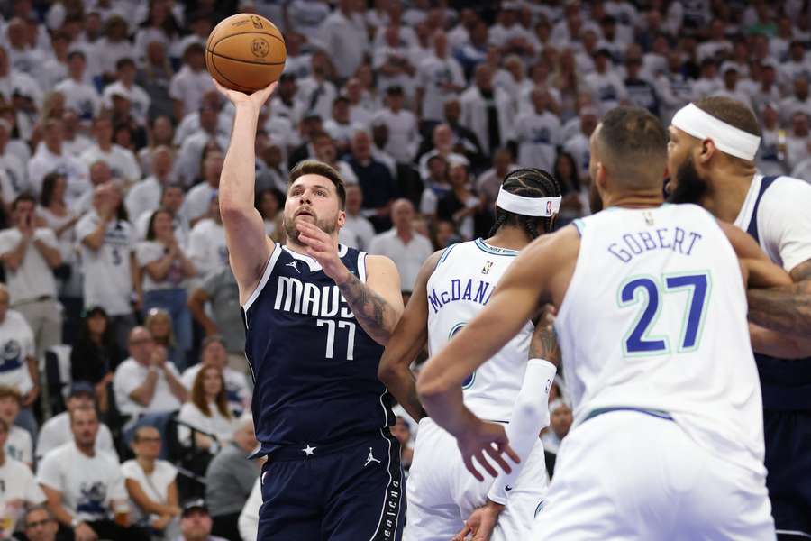 Luka Doncic scored 15 of his 33 points in the final quarter to see Dallas home