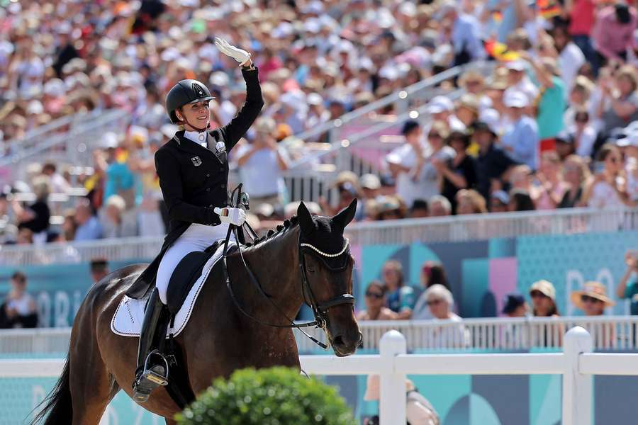 Jessica von Bredow-Werndl of Germany riding TSF Dalera BB reacts after competing