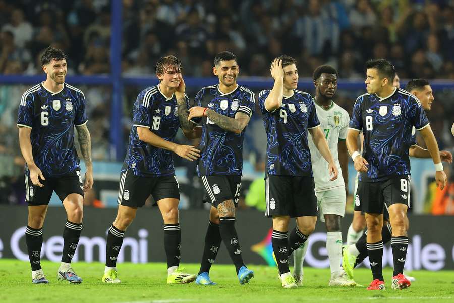 Nico Paz (2nd L) celebrates with teammates after scoring his team's second goal