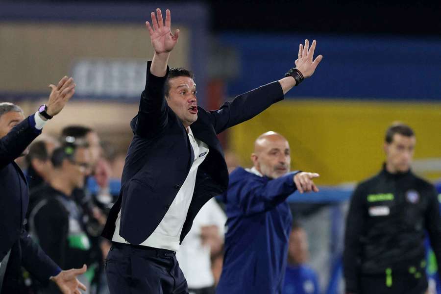 Inter's Cristian Chivu reacts on the touchline Inter's Cristian Chivu reacts on the touchline