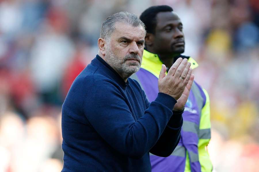 Ange Postecoglou applauds the fans after his side's win against Sheffield United
