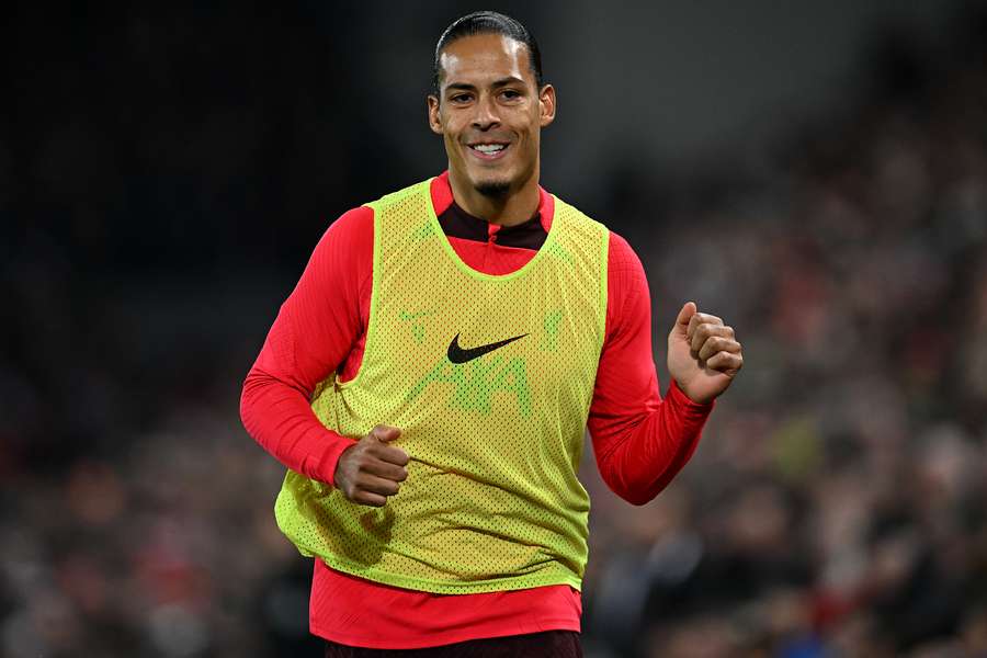 Liverpool's Dutch defender Virgil van Dijk returned to the bench against Everton