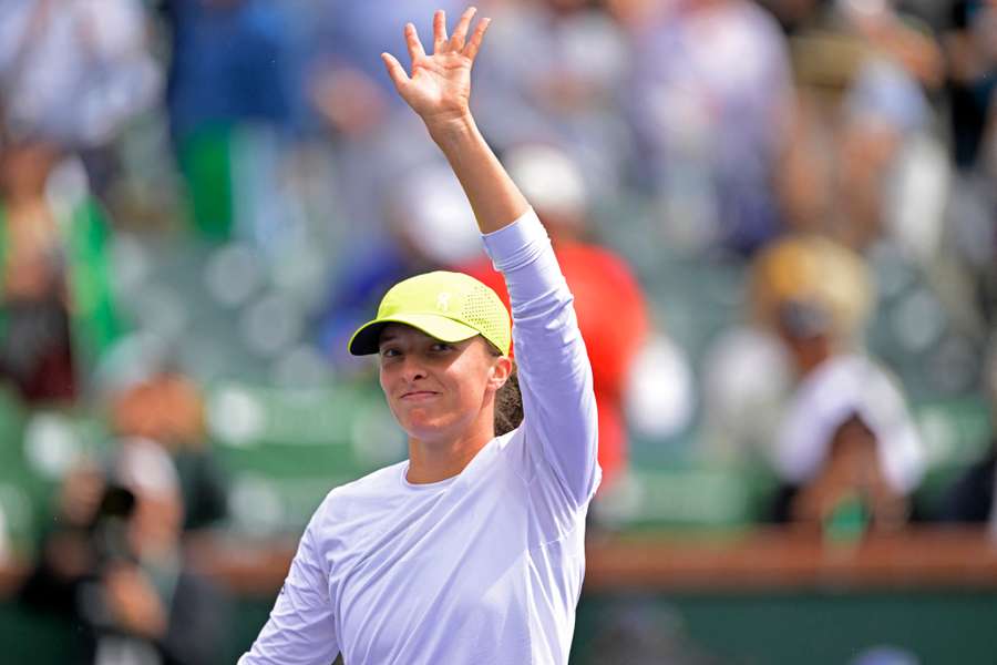 Iga Swiatek salutes the crowd after winning on Sunday Iga Swiatek salutes the crowd after winning on Sunday
