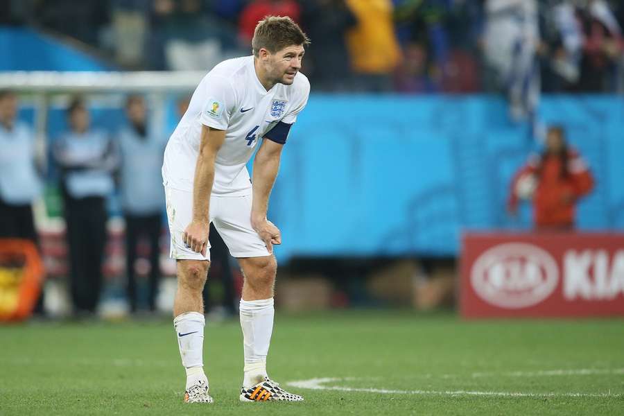 Steven Gerrard looks on during England's defeat to Uruguay at the 2014 World Cup