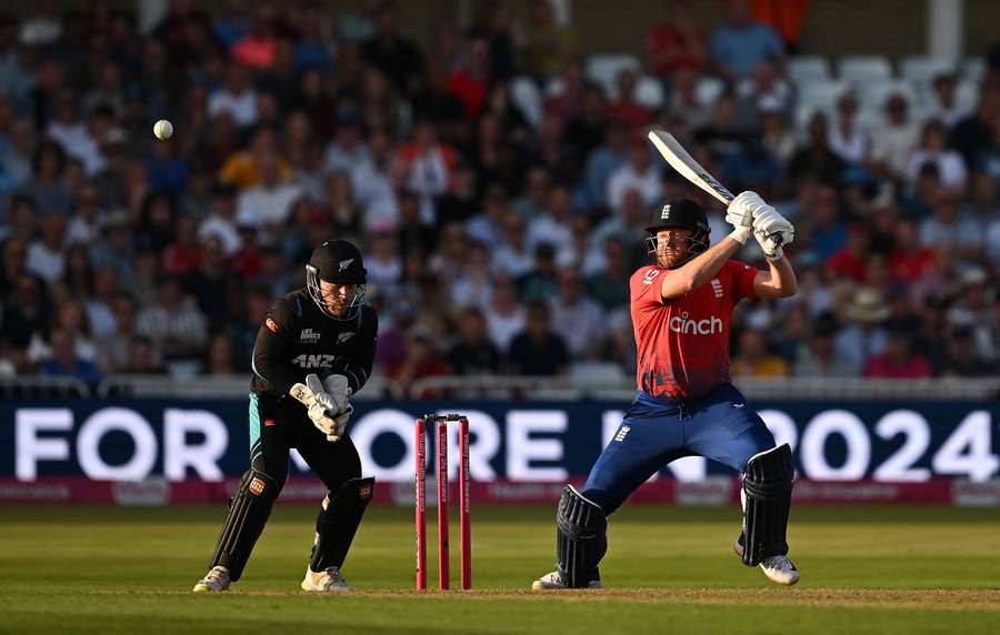 England's Jonny Bairstow watches the ball after playing a shot during the fourth T20 international cricket match between England and New Zealand