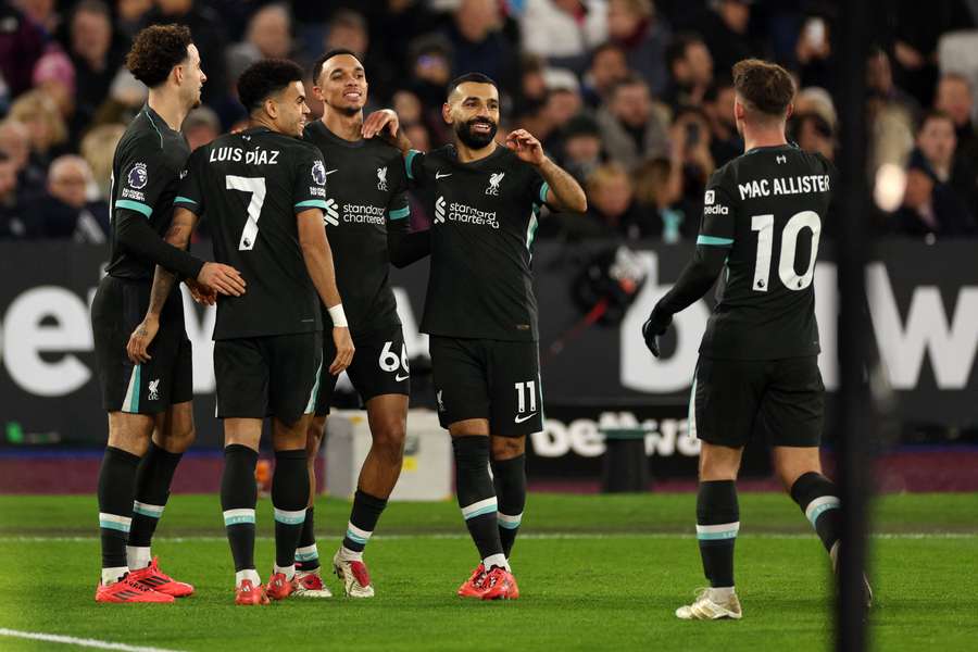 Liverpool's players celebrate their win