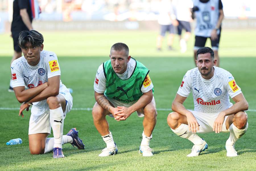 Die Kiel-Profis Machino, Holtby und Skrzbyski (v.l.n.r.).