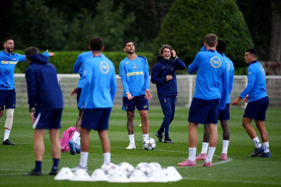Tottenham Hotspur manager Thomas Frank watches on during a training session