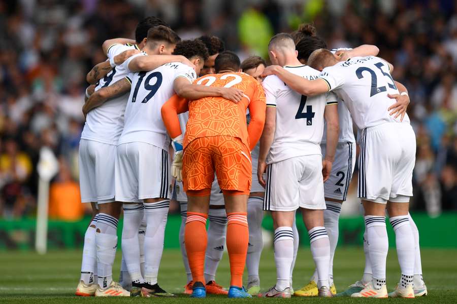 Leeds players form a group huddle ahead of kick-off in the English Premier League football match between Leeds United and Tottenham Hotspur