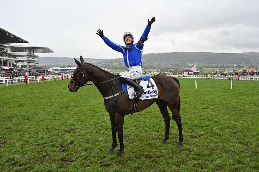 Jockey Paul Townend celebrates after riding horse Energumene to win the Queen Mother Champion Chase