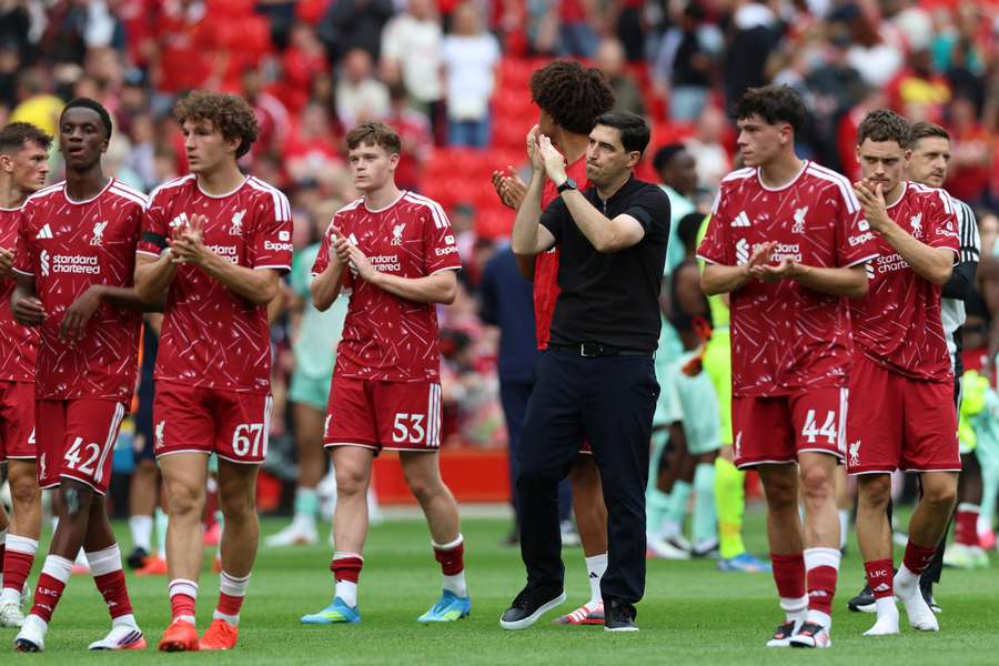 Andoni Iraola applauds fans after the pre-season friendly between Liverpool and Monaco at Anfield