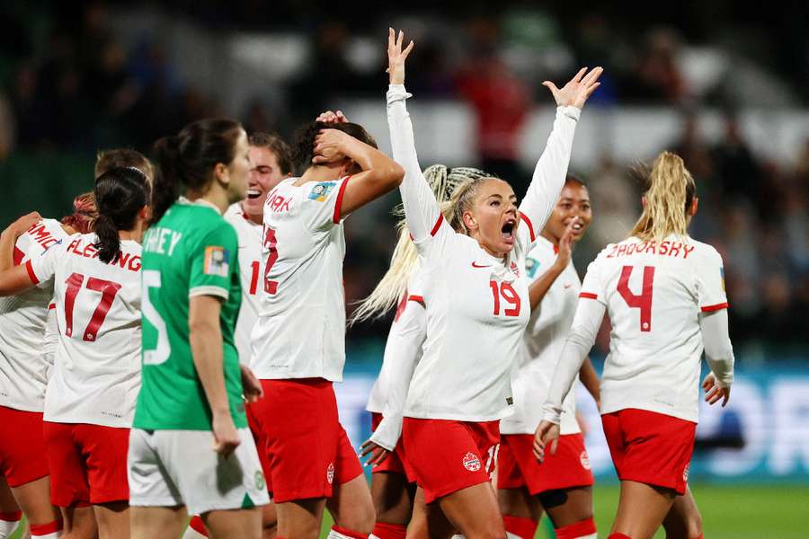 Canada's Adriana Leon celebrates scoring their second goal with teammates