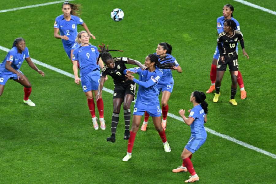 Jamaica's Vyan Sampson in action with France's Wendie Renard during the match