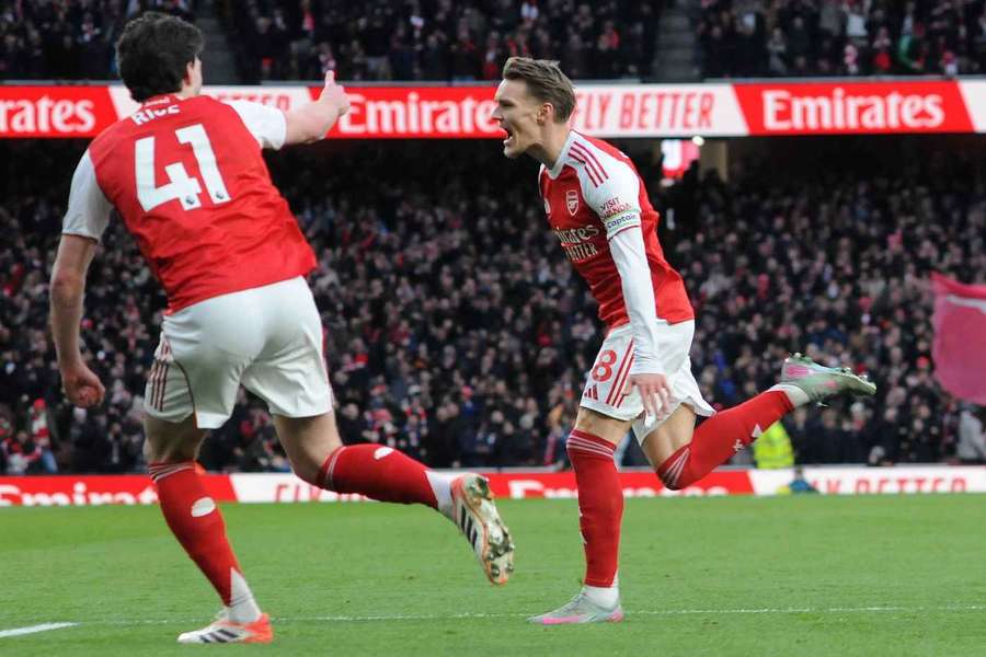 Martin Odegaard of Arsenal celebrates scoring his first-half goal