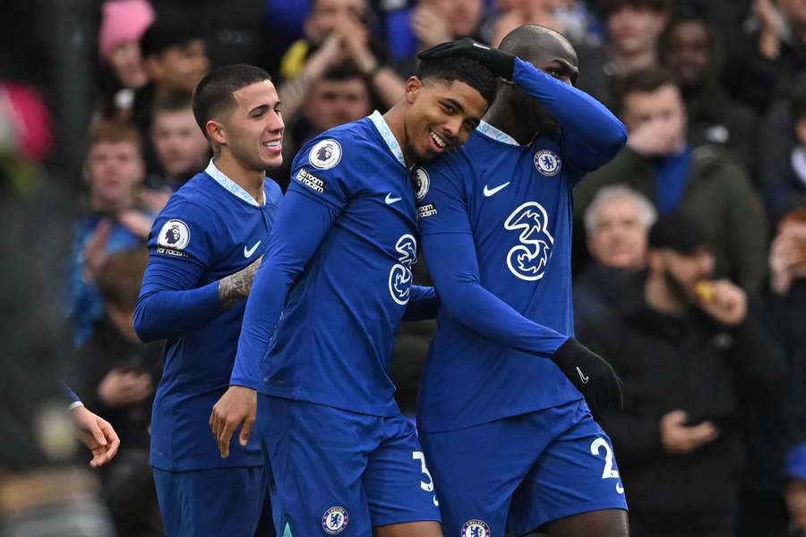 Chelsea's French defender Wesley Fofana (C) celebrates with teammates