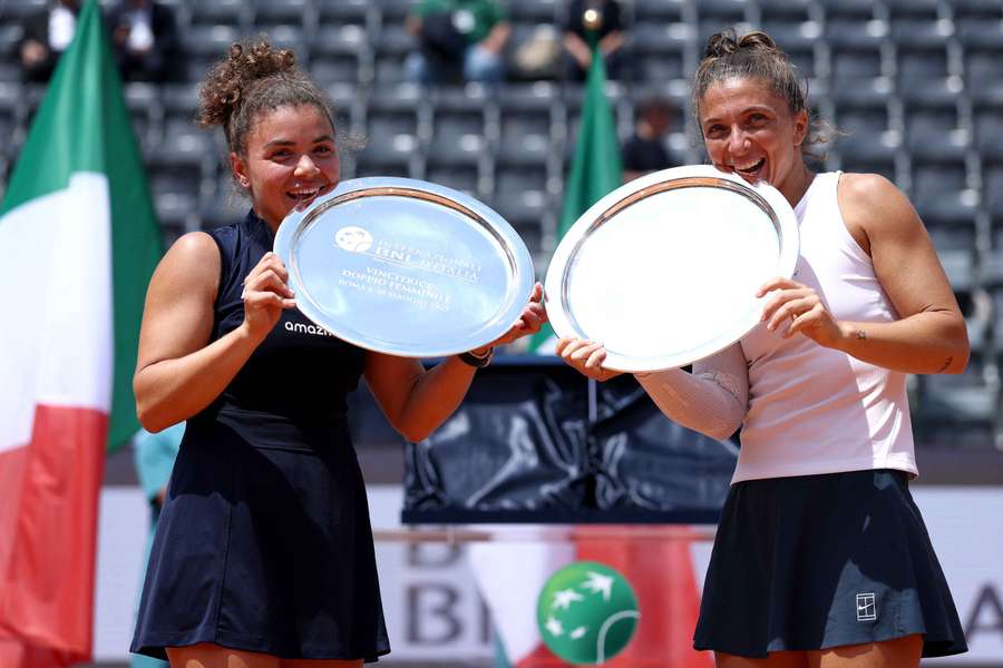 Paolini and Errani pose with their trophies