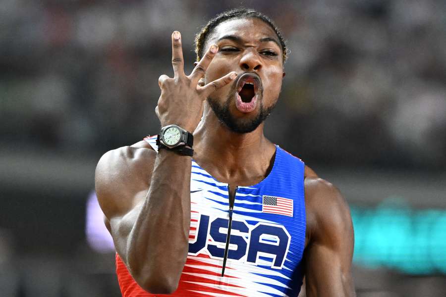 Noah Lyles celebrates after winning the 100m, 200m and 4x100m relay at the World Athletics Championships