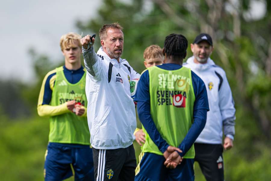 Graham Potter (second left) at a Sweden training session