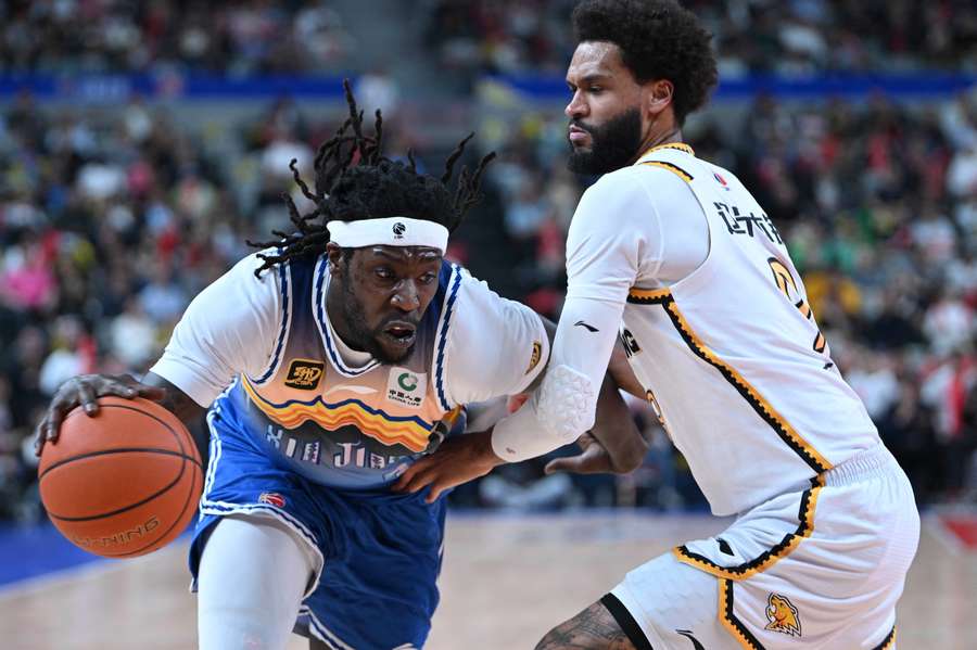 Harrell in action for Chinese club Xinjiang Flying Tigers during the NBL off-season.
