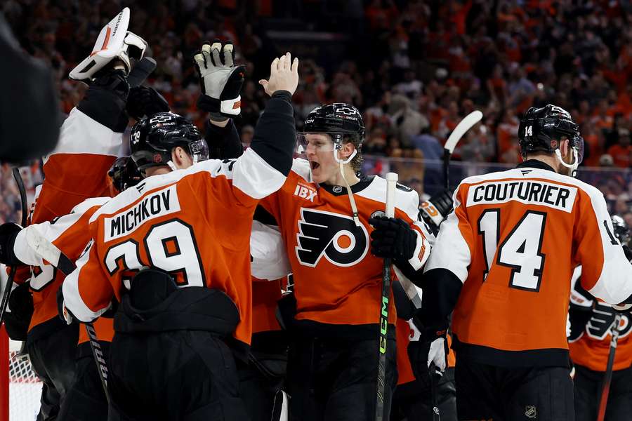 Flyers players celebrate 2026 playoff berth